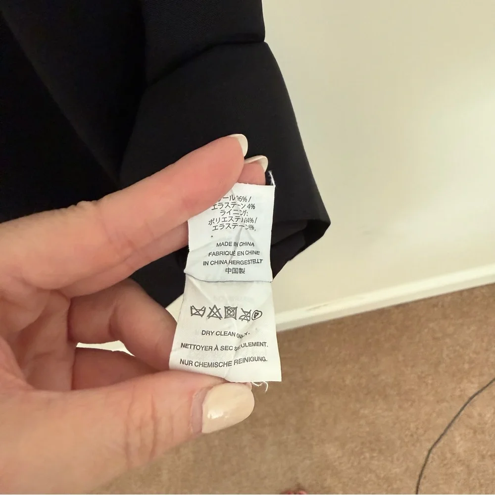 J. Crew Elegant Black Resume Dress. Pockets, back vent and zipper. Sleeveless.
